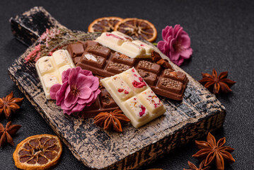 Multicolored handmade chocolate bars pink, white, brown colors