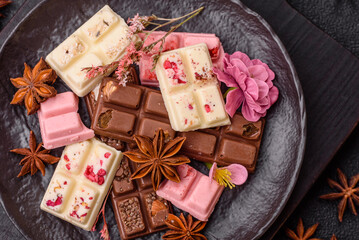 Multicolored handmade chocolate bars pink, white, brown colors