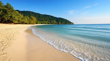 Obraz premium Pristine beach scene, tranquil waves, lush tropical hills, scenic coastal view