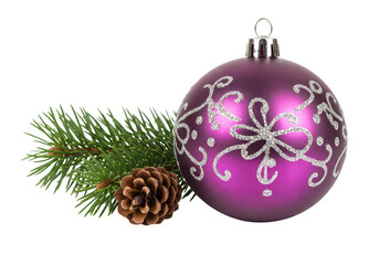 A shiny purple Christmas bauble placed next to a green pine branch and a small brown pinecone isolated on transparent background
