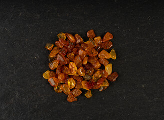 Amber stones, polished orange gemstones, natural Baltic amber gems, golden fossilized tree resin