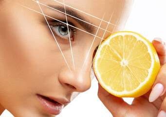 Permanent make-up for eyebrows of beautiful woman in beauty salon. Closeup beautician doing...