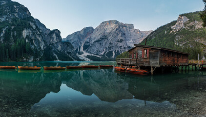lago di braies, pragser Wildsee lake, at the morning in summer with the legendary fishermans hut house