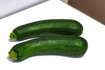 Healthy food. Zucchini on white background.