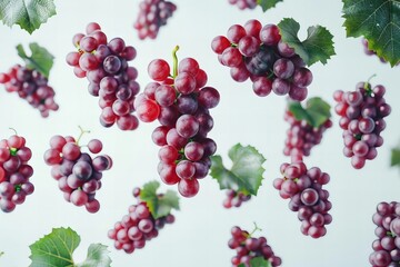 Fototapeta premium Captivating close-up of cascading red grapes on a blank canvas, ideal for mockups and cutouts.
