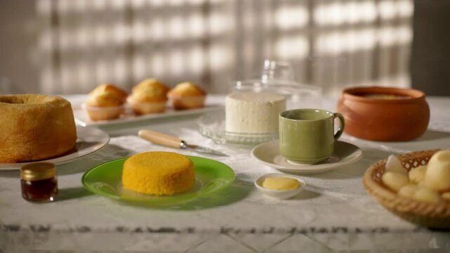 Traditional Brazilian Breakfast with Cuscuz, Cakes, and Steam