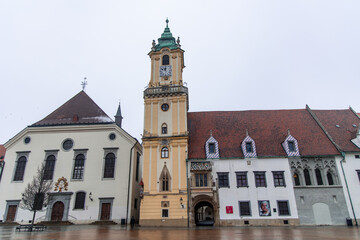 Fototapeta premium Old Town Hall in Bratislava showing its clock tower and surrounding buildings