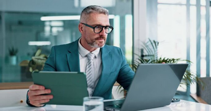 Laptop, tablet and reading with business man in office for client feedback, virtual advisor or news. Research, investment portfolio and tax refund with mature employee in agency for account admin