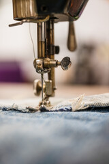 Vintage sewing machine in action.