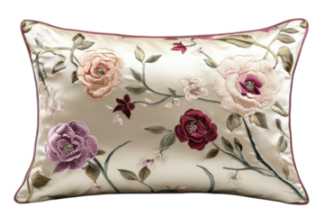 Elegant embroidered pillow with floral design in soft colors for home decor and comfort