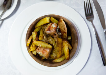 Delicious traditional Georgian meat dish Ojakhuri with potatoes and onions, fried with aromatic...