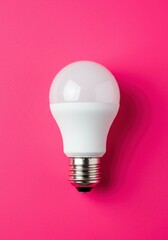 A classic white light bulb glowing on a bright backdrop, symbolizing innovation and solutions.
