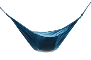 Relaxation in a blue hammock suspended between two trees in a tranquil outdoor setting during the afternoon