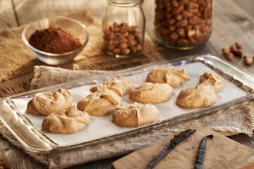 Making alternative healthy sweets from greek yogurt, nut butter, maple syrup and vanilla pods