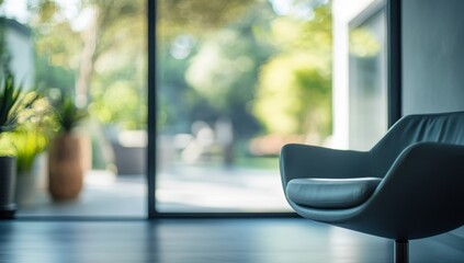 Modern armchair by glass doors to garden