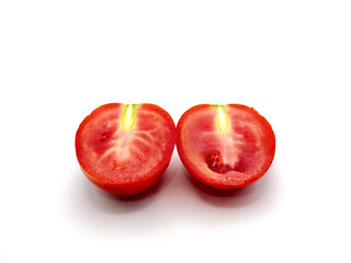 A halved of tomato isolated on a clean white background