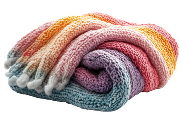 Cozy multicolored knitted blanket rolled up on a white background ready for use in a living room or bedroom