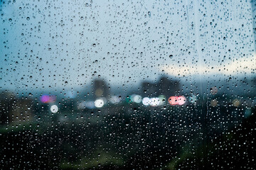 Raindrops on a Window: A Serene and Reflective Moment © Gev