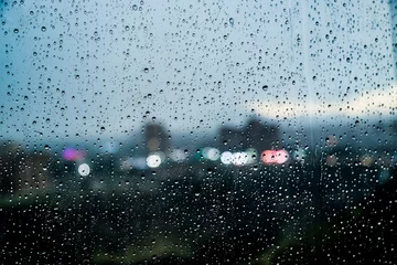 Raindrops on a Window: A Serene and Reflective Moment