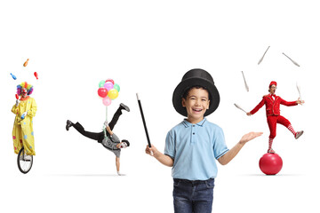 Boy with a magic hat and a group of circus entertainers performing © Ljupco Smokovski