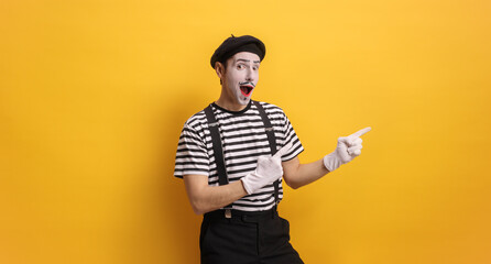 Excited mime pointing to the side