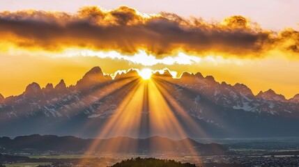 Morning sunrise action over majestic mountains nature landscape dramatic light rays scenic viewpoint awe-inspiring concept