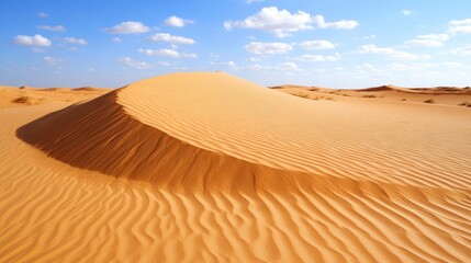 Desert dune landscape under a blue sky