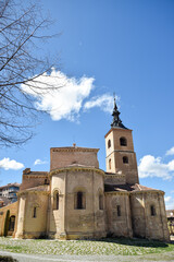 Medieval Church in limestone with arches, semicircular flares and Herrerian roof