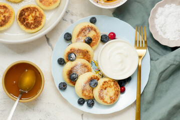 Cheese pancakes with yogurt and berries..style hugge