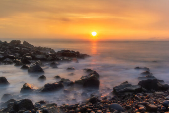 Sunset at breakwater in Dolphins Beach, Miraflores District - Lima, Peru
