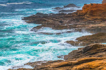 Overcast morning seascape with rocky headland at Bermagui