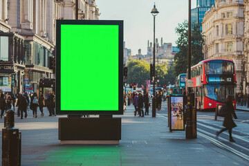 A Digital billboard mockup in London street scene with pedestrian traffic, modern style, and green screen ready for insertion