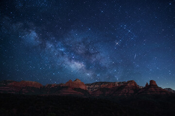 Sedona red rock mountain range nightscape with milky way