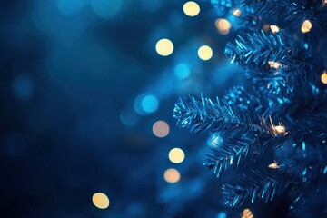Close-up of a blue Christmas tree with warm lights.