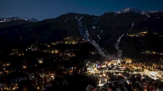 Whistler Mountain aerial hyperlapse at night, snow groomers, city lights, mountain night, ski resort, Whistler Blackcomb. 4K 24FPS PRORES