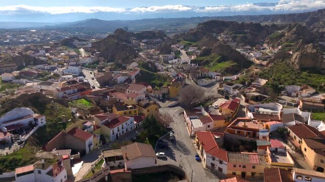 Guadix Cave Houses, Dewlling troglodyte city. Aerial of Prehistoric caves settlement in the mountains of Granada, Spain
