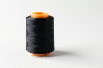 Black sewing thread spool and needle on white , craft, wool, thread