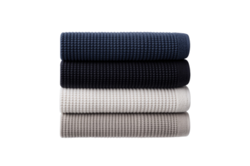 Stack of four different colored towels, isolated