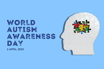 Autism Day, head made of white puzzles and brain made of colored puzzles on a blue background, with text