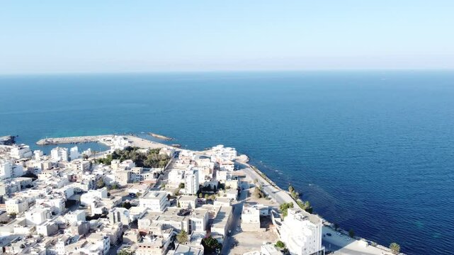 Drone footage of the coastal city of Monastir in Tunisia, the mediterranean. 