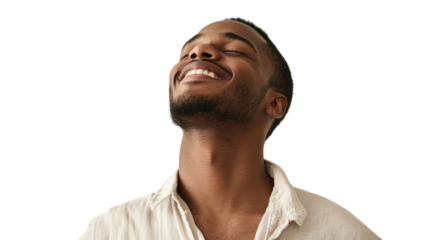 A joyful man smiles with eyes closed, radiating positivity against a white background.