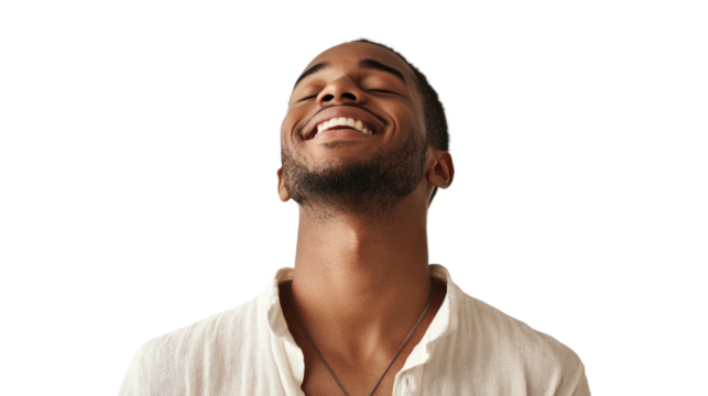 Cheerful man smiling with eyes closed, expressing joy and contentment against a white isolated background.