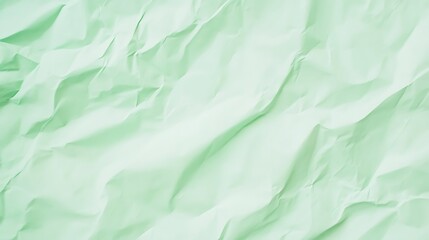 Obraz premium Soft Green Crumpled Paper Texture Background, Raw Style, High-Resolution Abstract Wrinkled Surface