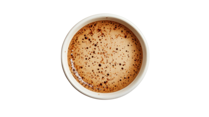 Top view of a cup of latte with frothy texture and coffee art, white isolated background.