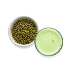 Fresh mung bean juice in glass and seeds isolated on white, top view