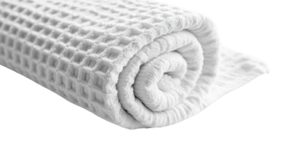 Soft, rolled white towel on a white background, perfect for spa, bath, or kitchen settings.