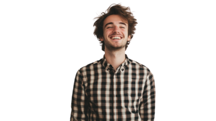 Smiling young man in a checkered shirt expressing joy and happiness.