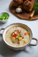 A bowl of soto Betawi 