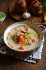 A bowl of soto betawi 