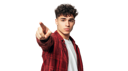 A young man with curly hair in a plaid shirt pointing forward with determination and confidence.